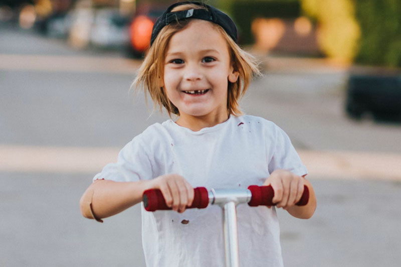 Boy on a scooter